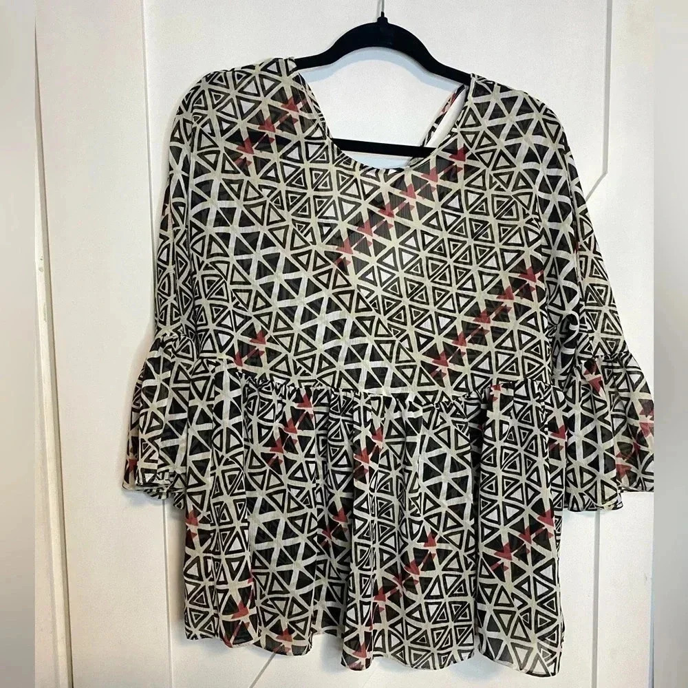 BCBG Generation - geometric pattern blouse - ruffle bottom - boho tribal